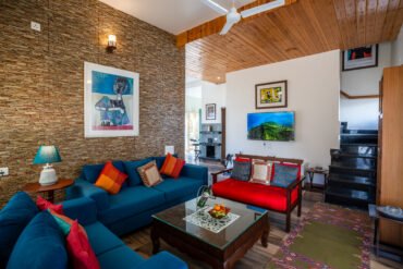 Bright living room with sofas at a 3R Stays chalet